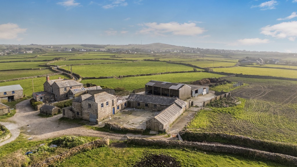Lot: 3 - COMPLEX OF GRANITE BARNS, DUTCH BARN, CATTLE SHED FARMYARD AND LAND WITH POTENTIAL - Aerial view